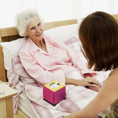 Elderly Senior Home Care Frail Woman in Bed