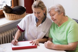 Nurse Helping Ederly Lady