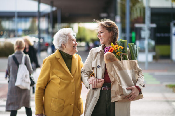 Young caregiver gives memory care and companionship to mature woman in Durham, NC.